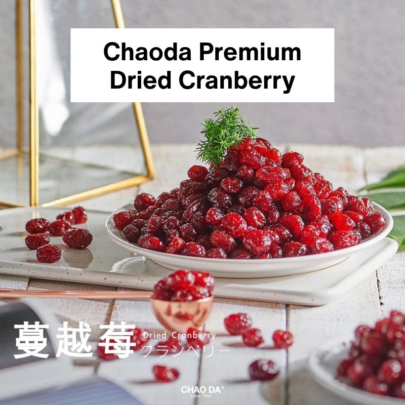 Chaoda Premium Dried Cranberry with a decorative setting on a wooden table.