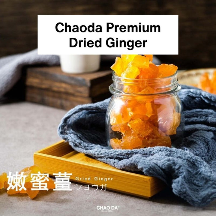 Jar of dried ginger with a wooden tray and gray cloth on a wooden surface, featuring 'Chaoda Premium Dried Ginger' text.