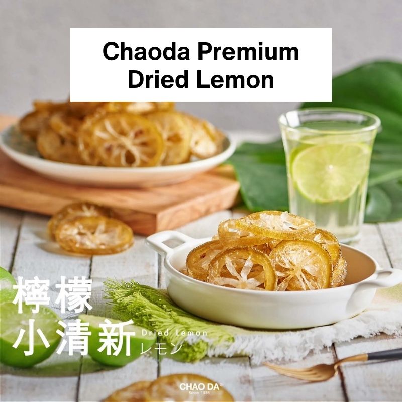 Dried lemons in a bowl with a glass of lemon water on a wooden table, featuring Chaoda Premium Dried Lemon branding.