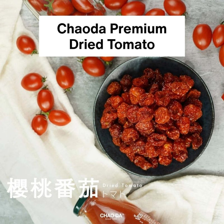 Dried tomatoes in a bowl with fresh tomatoes and Chaoda Premium Dried Tomato packaging.