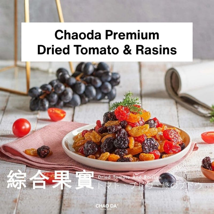Dried tomatoes and raisins on a plate with grapes in the background, featuring Chaoda Premium brand.