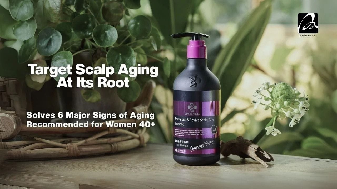 Shampoo bottle with greenery on a wooden surface, promoting scalp aging solution.