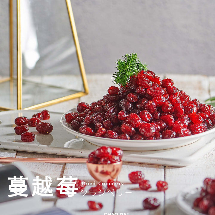 Dried cranberries on a white plate with a blurred background