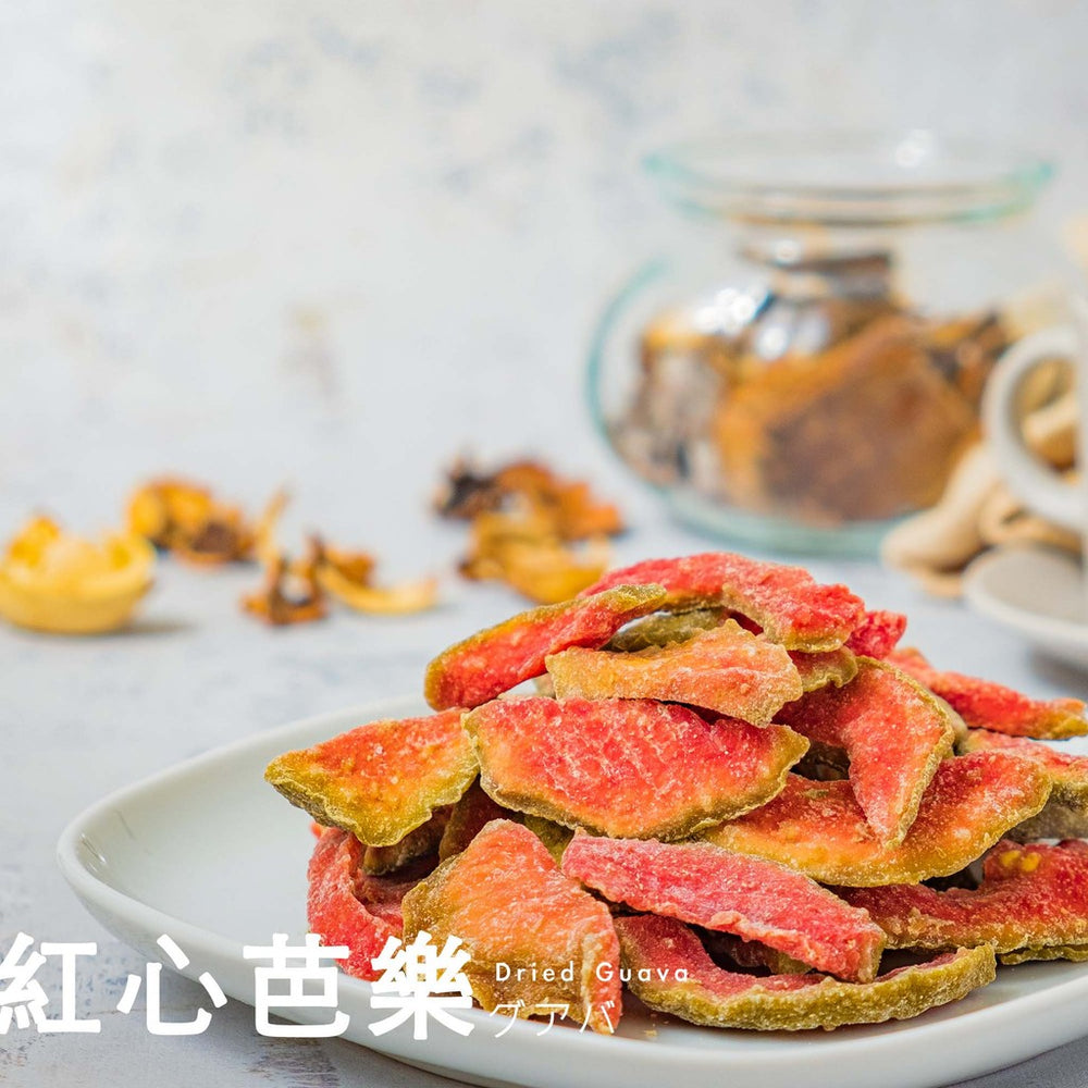 Dried guava slices on a plate with a blurred background