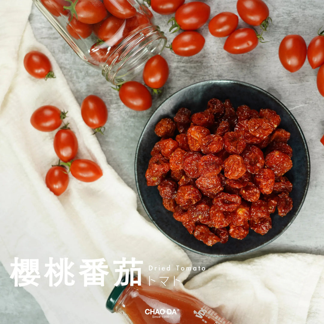 Dried tomatoes in a bowl with fresh cherry tomatoes and a jar on a light background