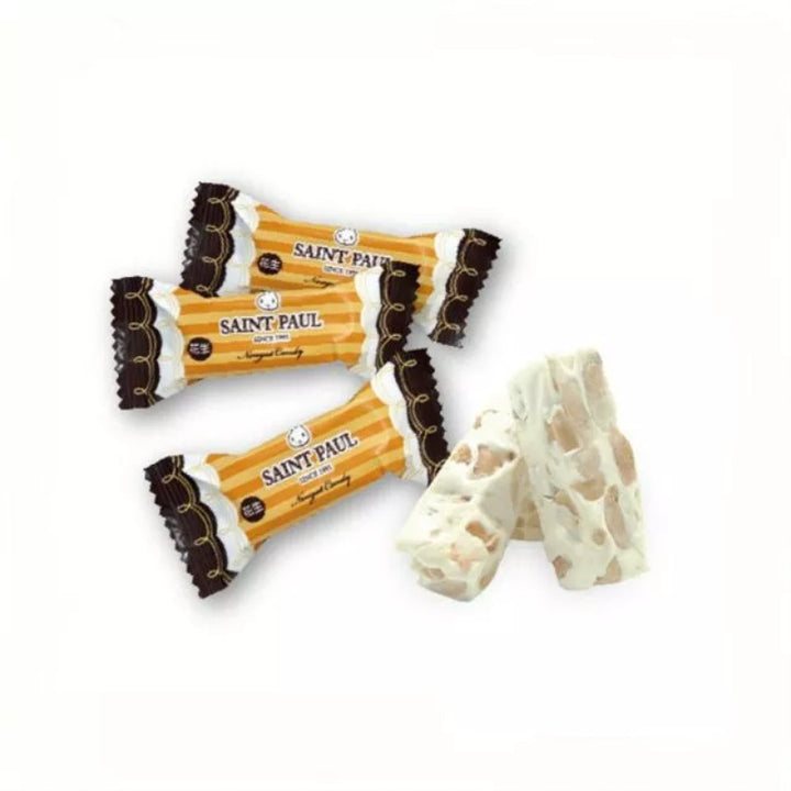 Saint Paul nougat bars with packaging on a white background