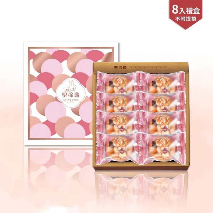Gift box with pink and brown design featuring a brand logo, on a light pink background.