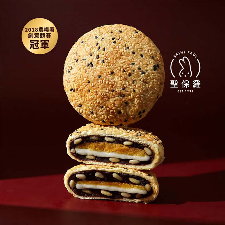  Sesame seed cookie with a cross-section showing filling on a red background, featuring 'Saint Paul' brand.