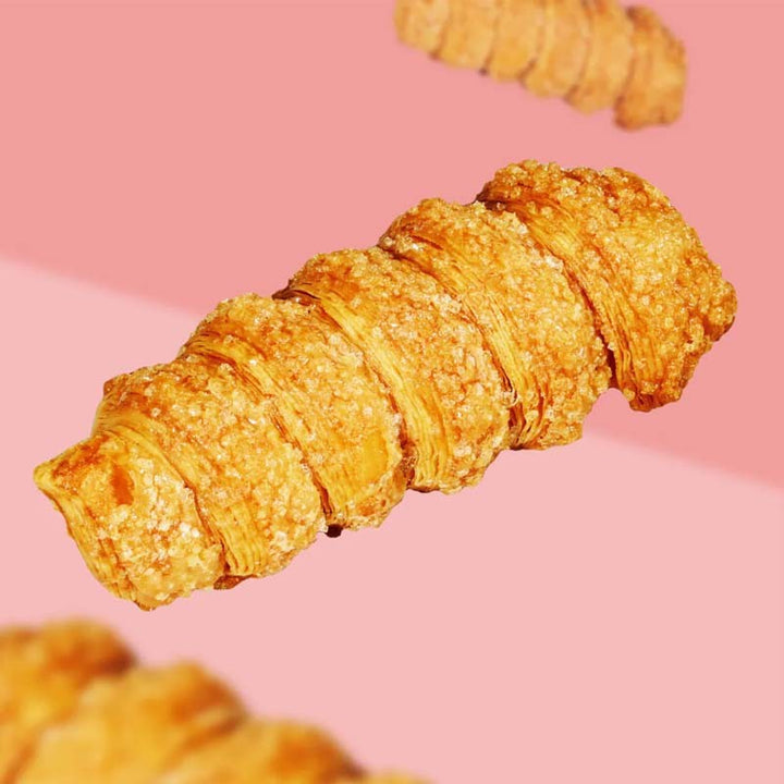 Croissant on a pink background