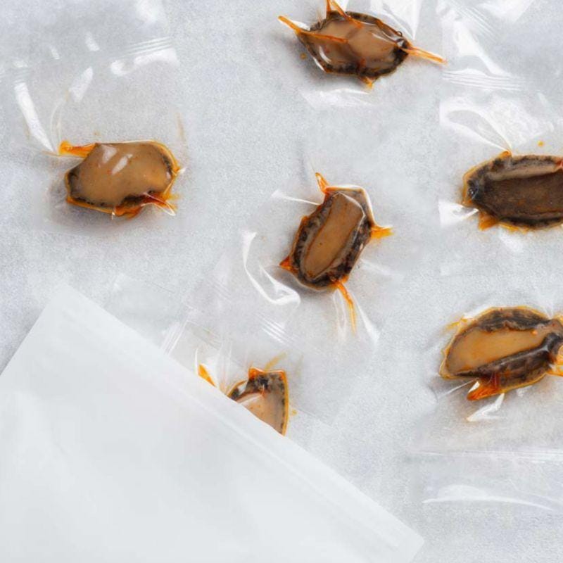 Flying Banana Crisps & Puffed Snacks CNY Bite Size Cheesy Scallops And Abalone 100g Ready to Eat (Frozen) CNY Bite Size Cheesy Scallops And Abalone 100g Ready to Eat (Frozen)